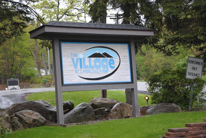 Entrance Sign for The Village at Camelbeack - A Private Gated Vacation Community