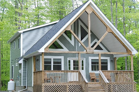 Poconos PA Vacation Home For Rent - Relax on the large covered front porch and watch nature go by